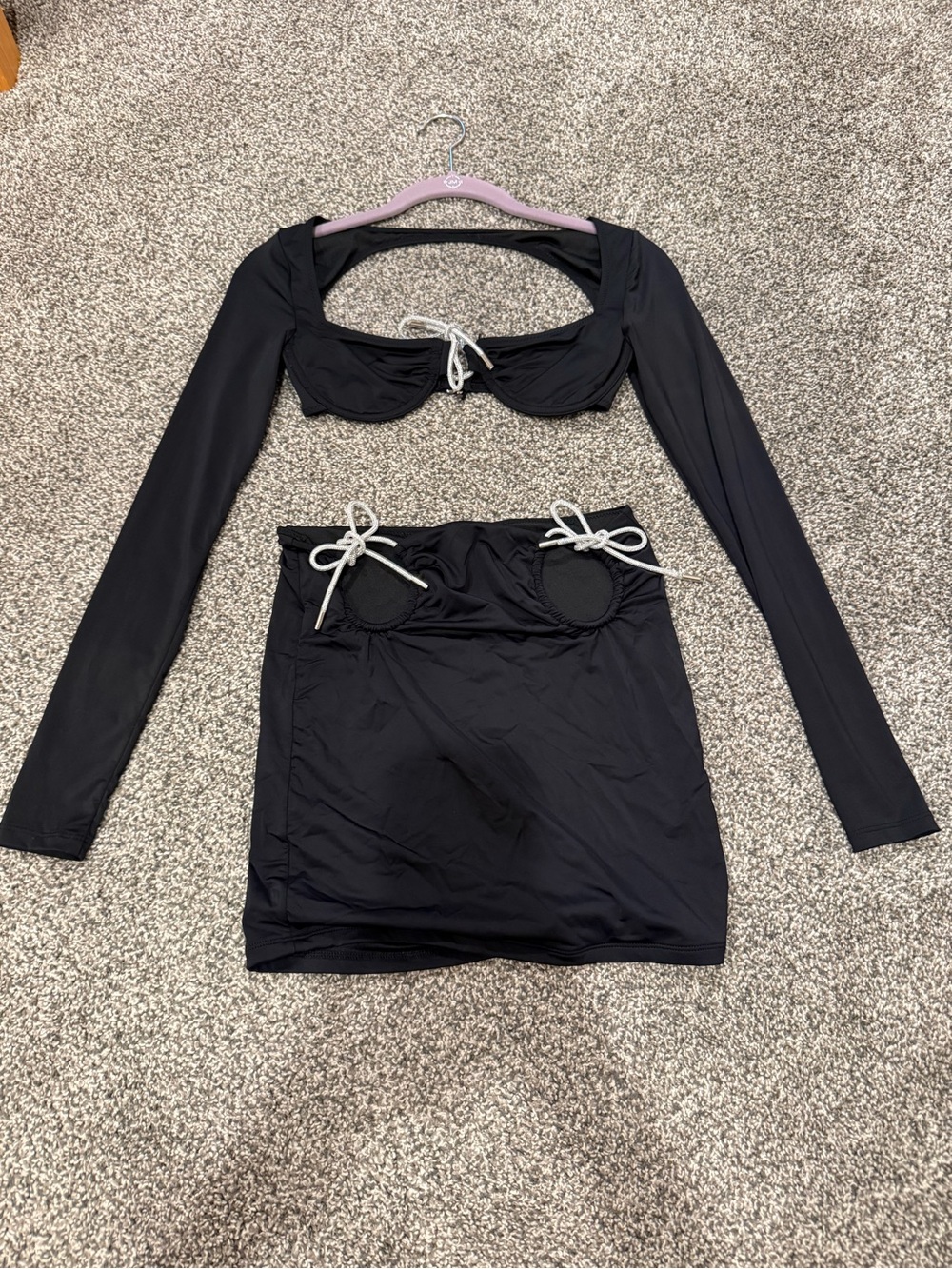 White Fox Boutique Black Mini Skirt with Tie-Cutouts